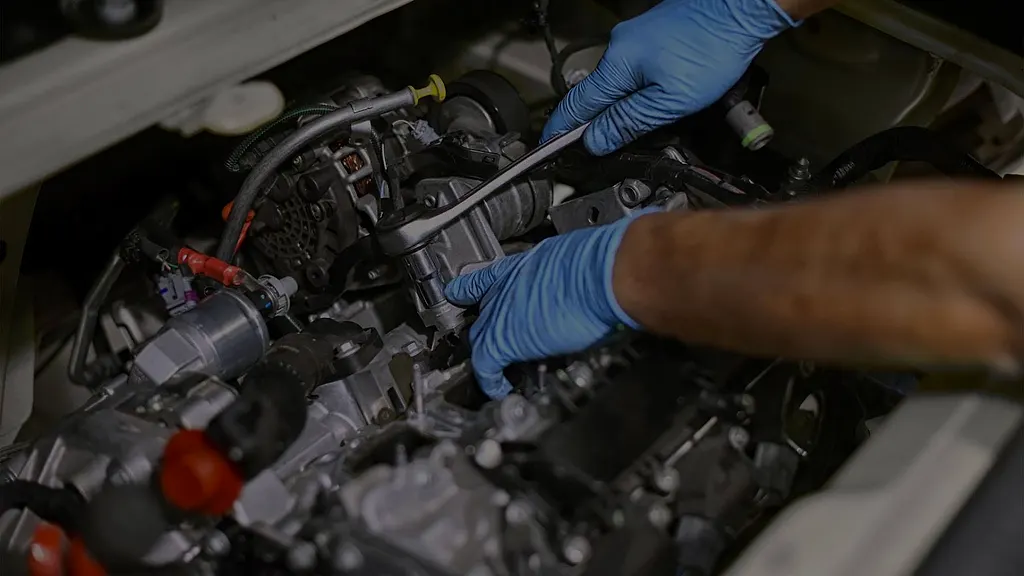 Mechanic working on a car engine Raimondi Auto Services Old Woking
