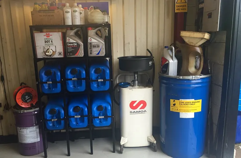 Oils and fluids stocked in the Raimondi Auto Services workshop Old Woking